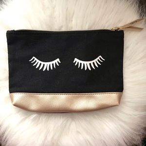 Ipsy black & gold bag
